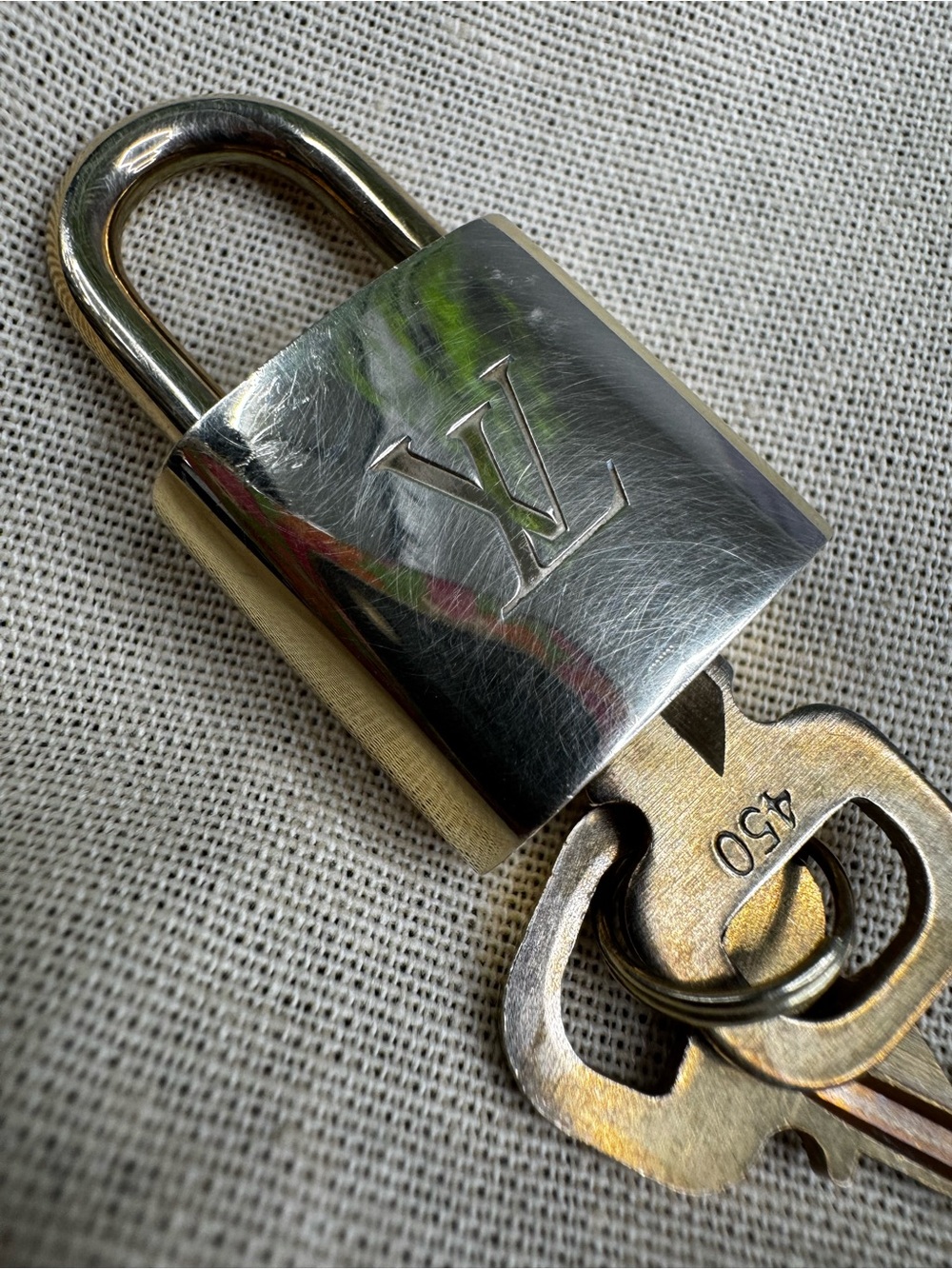 Louis Vuitton lock and two keys. #450